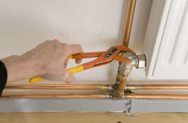 Plumber radiator stock photos Plumber radiator stock photos