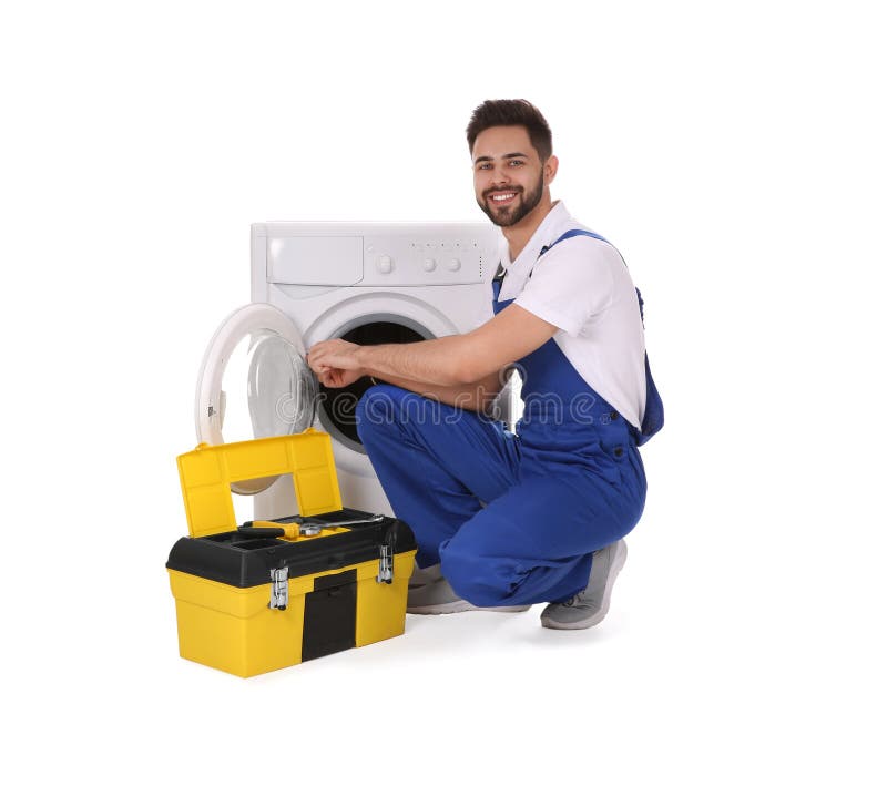 Plumber repairing washing machine on background stock images Plumber repairing washing machine on background stock images