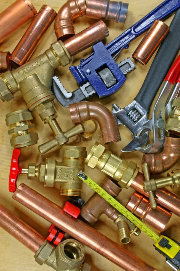 Plumber`s Pipes and Fittings Stock Photo Image of copper, website
