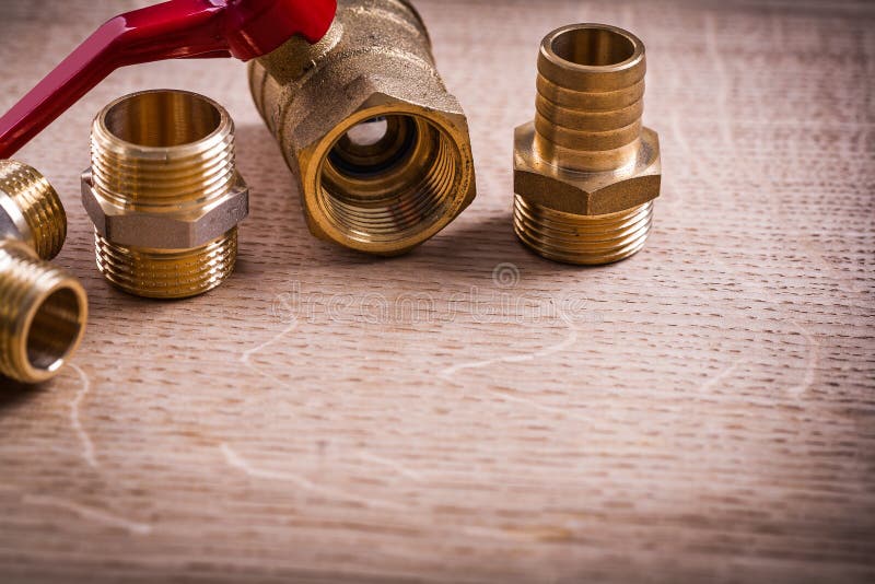 Plumbing Tools Brass Pipe Connectors on Wooden Stock Image Image of