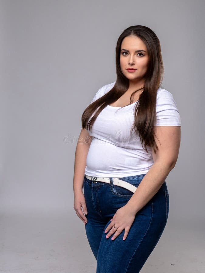 Plus Size Model with Long Hair in Studio Stock Image of weight, caucasian: 167060884
