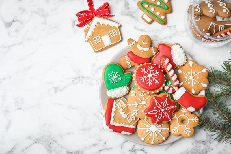 Plate with tasty homemade Christmas cookies on table, top view. Plate with tasty homemade Christmas cookies on table, top view