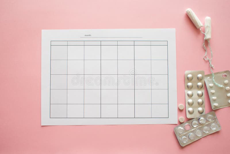 PMS y el concepto cr?tico de los d?as Calendario mensual en blanco para menstrual, PMS o marcas de la ovulaci?n fotografía de archivo PMS y el concepto cr?tico de los d?as Calendario mensual en blanco para menstrual, PMS o marcas de la ovulaci?n fotografía de archivo