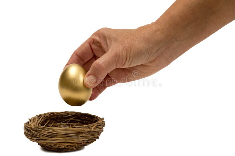 Putting the golden egg into the nest. Isolated on white with shadow around base of nest. Putting the golden egg into the nest. Isolated on white with shadow around base of nest.