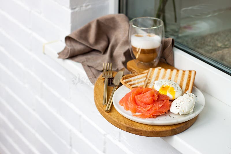 Poached Egg with Smoked Salmon, Toasted Bread and Coffee on White