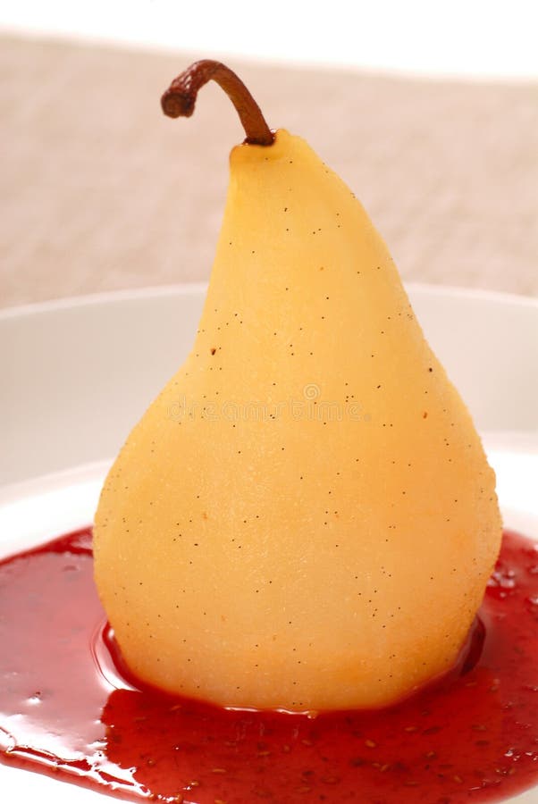 Poached pear with a raspberry sauce