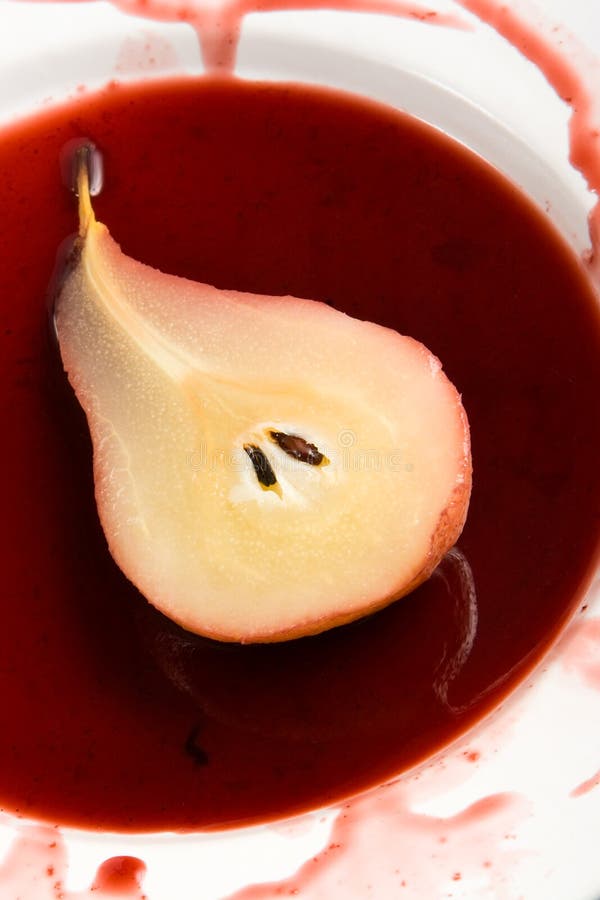 Poached pear in red wine sauce