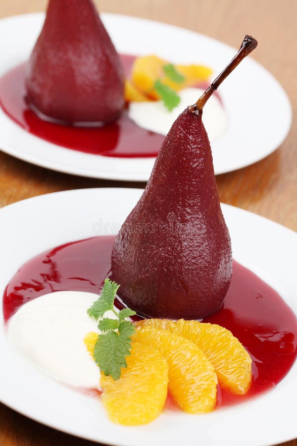 Poached pears with creme fraiche and oranges