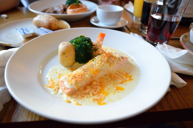 Poached salmon fillet stock photos