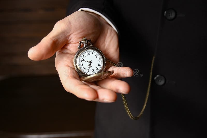 A Pocket Watch in the Hands of a Man Stock Photo Image of design