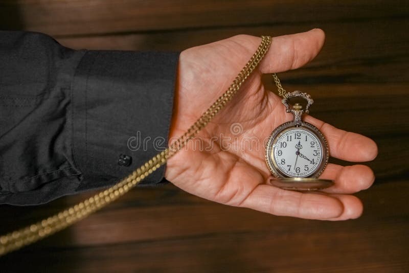 A Pocket Watch in the Hands of a Man Stock Photo Image of macro, gold