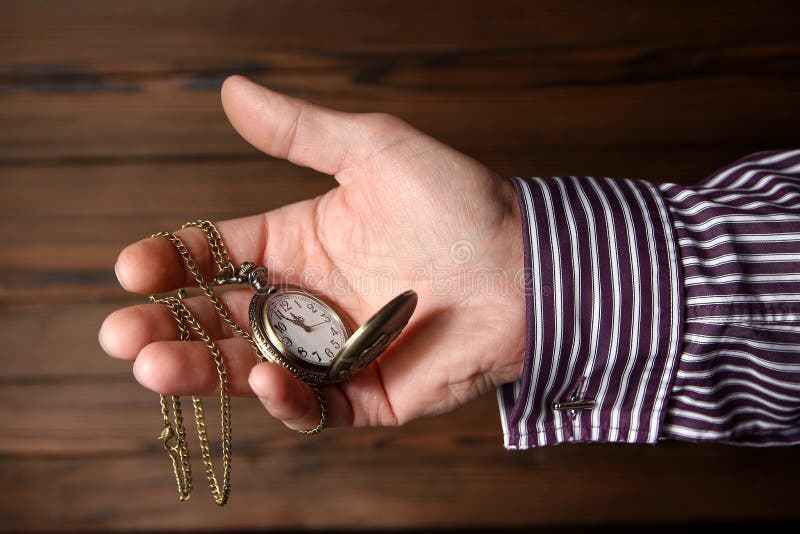 A Pocket Watch in the Hands of a Man Stock Photo Image of human