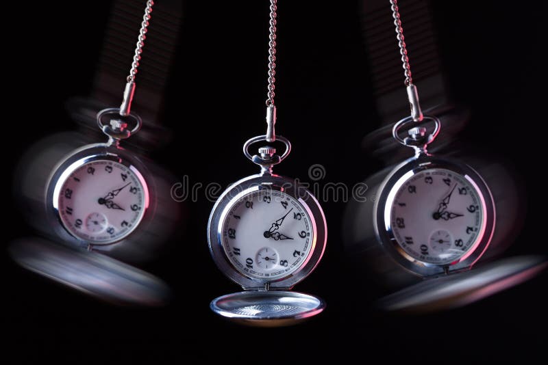 Pocket watch swinging on a chain to hypnotise