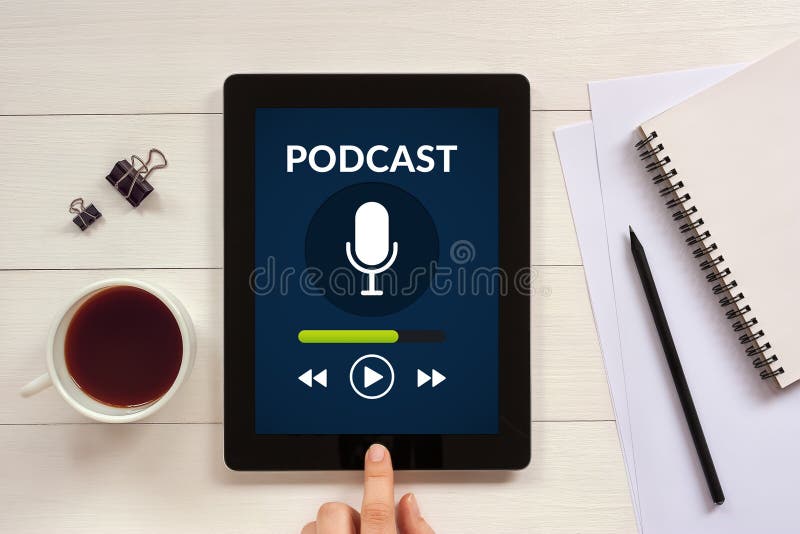 Podcast concept on tablet screen with office objects royalty free stock photos