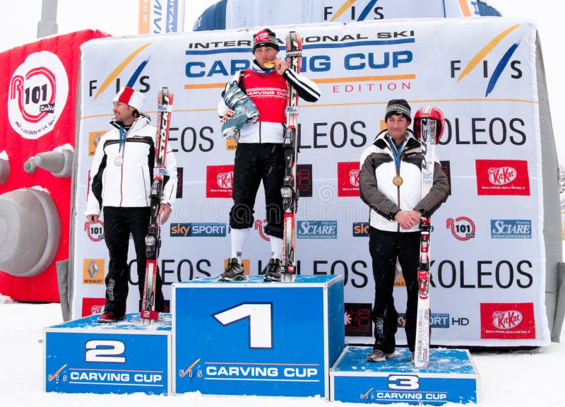 BARDONECCHIA - JANUARY 30:italians skiers 1° Thomas Bergamelli, 2° Giancarlo Bergamelli, 3° Umberto Simoncelli, podium of FIS Speed Carving World Challenge 2011 january 30, 2011 in Bardonecchia, Italy. BARDONECCHIA - JANUARY 30:italians skiers 1° Thomas Bergamelli, 2° Giancarlo Bergamelli, 3° Umberto Simoncelli, podium of FIS Speed Carving World Challenge 2011 january 30, 2011 in Bardonecchia, Italy