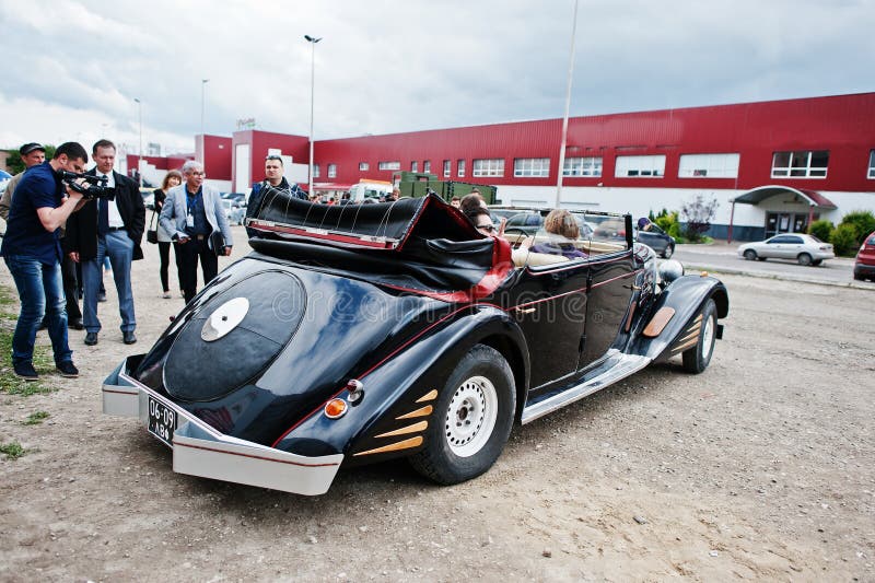 Podol, Ukraine - May 19, 2016: Rear view of Maybach Zeppelin DS 8 Roadster, luxury classic car, built in Stuttgart, Germany 1928-1938. Podol, Ukraine - May 19, 2016: Rear view of Maybach Zeppelin DS 8 Roadster, luxury classic car, built in Stuttgart, Germany 1928-1938