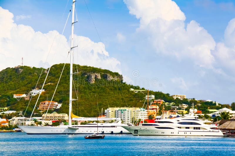 Multimillion dollar yachts dot Simpson's Bay Lagoon on the beautiful Caribbean island of St. Maarten. Multimillion dollar yachts dot Simpson's Bay Lagoon on the beautiful Caribbean island of St. Maarten.