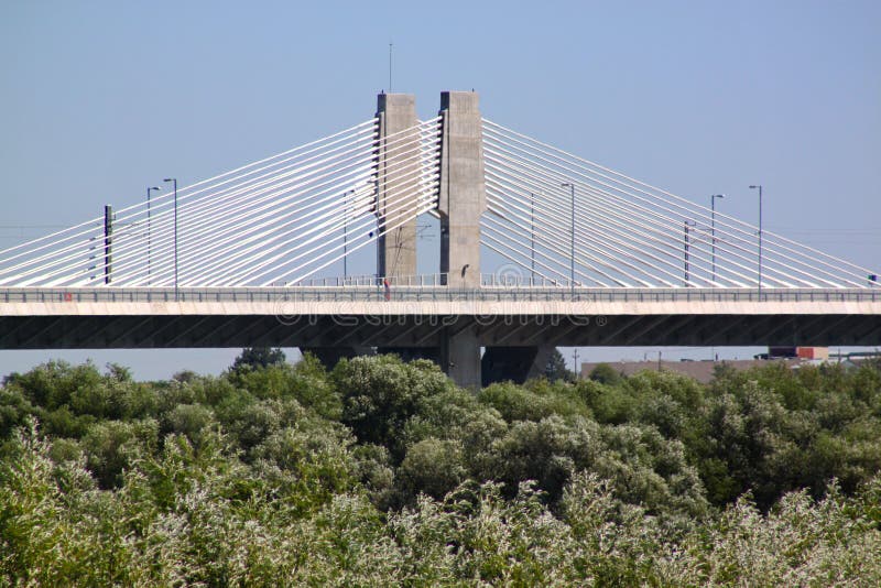 The New Europe Bridge  is a road and rail bridge between the cities of Vidin, Bulgaria, and Calafat, Romania. It is the second bridge on the shared section of the Danube between the two countries. It is an extradosed bridge and was built by the Spanish company Fomento de Construcciones y Contratas, at the cost of �226 million. It was officially opened with a ceremony held on 14 June 2013. The first vehicles were allowed to cross the bridge after midnight, on 15 June 2013.
Bulgaria. The New Europe Bridge  is a road and rail bridge between the cities of Vidin, Bulgaria, and Calafat, Romania. It is the second bridge on the shared section of the Danube between the two countries. It is an extradosed bridge and was built by the Spanish company Fomento de Construcciones y Contratas, at the cost of �226 million. It was officially opened with a ceremony held on 14 June 2013. The first vehicles were allowed to cross the bridge after midnight, on 15 June 2013.
Bulgaria