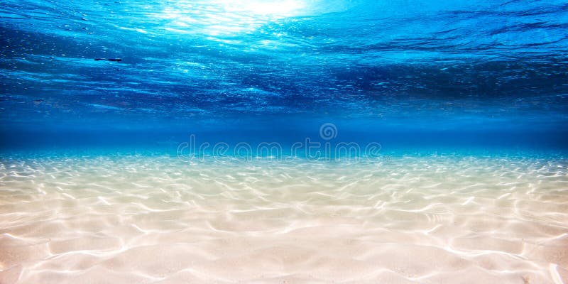 Podwodnego błękitnego oceanu piaskowaty tło