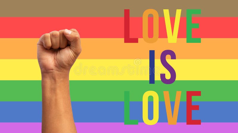 Poing up avec lgbt drapeau avec texte amour photographie stock libre de droits