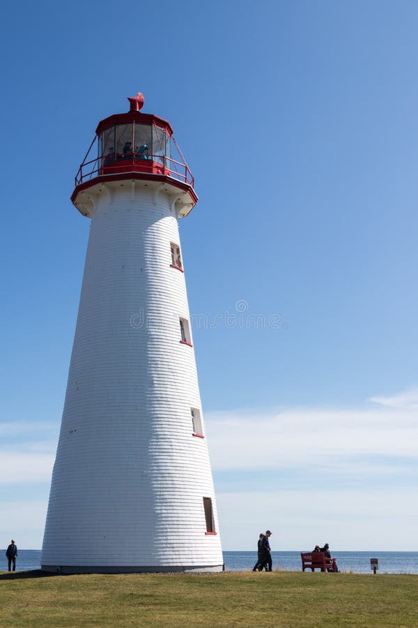 Point Prim Light House Museum in PEI. Tourists roam around the base of the Point Prim Light House Museum in PEI, Canada on the coast of the Atlantic Ocean royalty free stock images Point Prim Light House Museum in PEI. Tourists roam around the base of the Point Prim Light House Museum in PEI, Canada on the coast of the Atlantic Ocean royalty free stock images