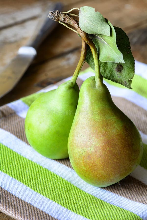 Delicious ripe pears on wooden table. Delicious ripe pears on wooden table.