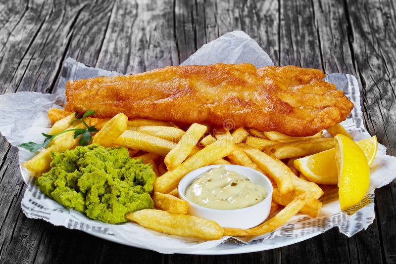 Poisson-frites croustillants délicieux, plan rapproché photos libres de droits Poisson-frites croustillants délicieux, plan rapproché photos libres de droits