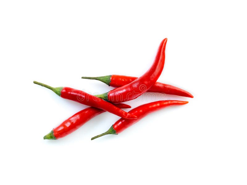 Poivre de piment d'un rouge ardent sur le fond blanc, vue supérieure images libres de droits Poivre de piment d'un rouge ardent sur le fond blanc, vue supérieure images libres de droits