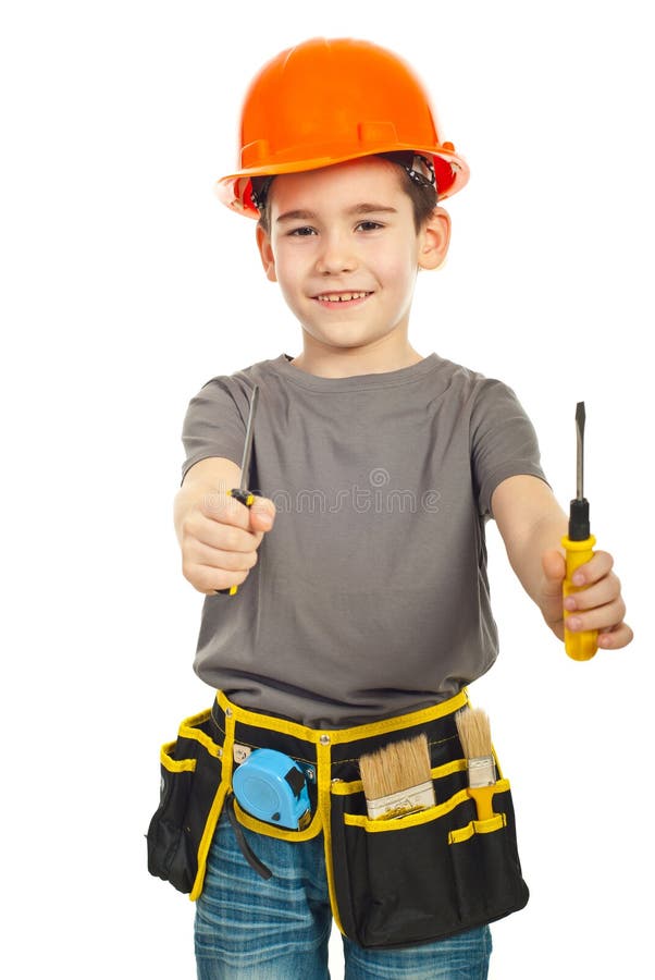 Little constructor boy giving two screwdrivers and smiling isolated on white background. Little constructor boy giving two screwdrivers and smiling isolated on white background