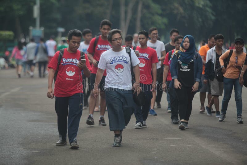 Pokemon gaat trainer in Indonesië stock foto's Pokemon gaat trainer in Indonesië stock foto's