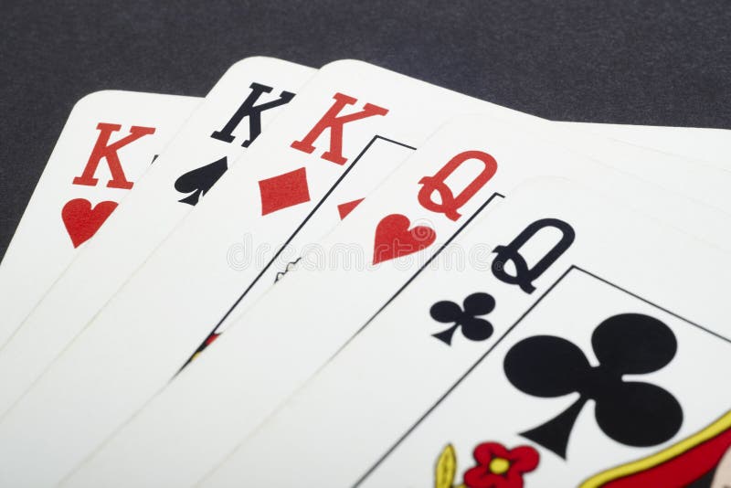 Poker Card Game With Kings And Queens Full. Black Background Stock