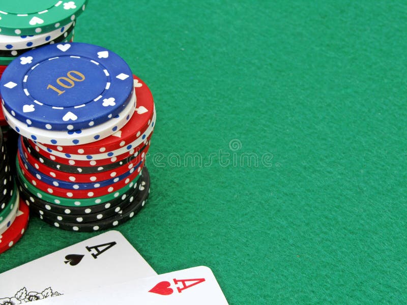 Poker chips & aces stock images
