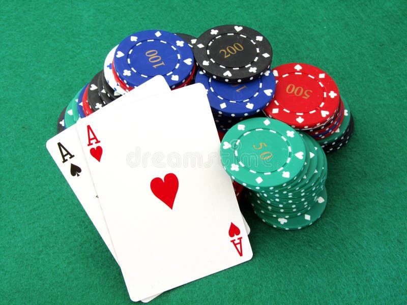 Poker chips & aces royalty free stock photo