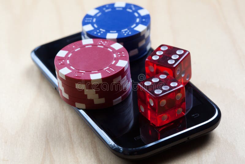Poker Chips and Dices on Top of Cell Phone Stock Image Image of space