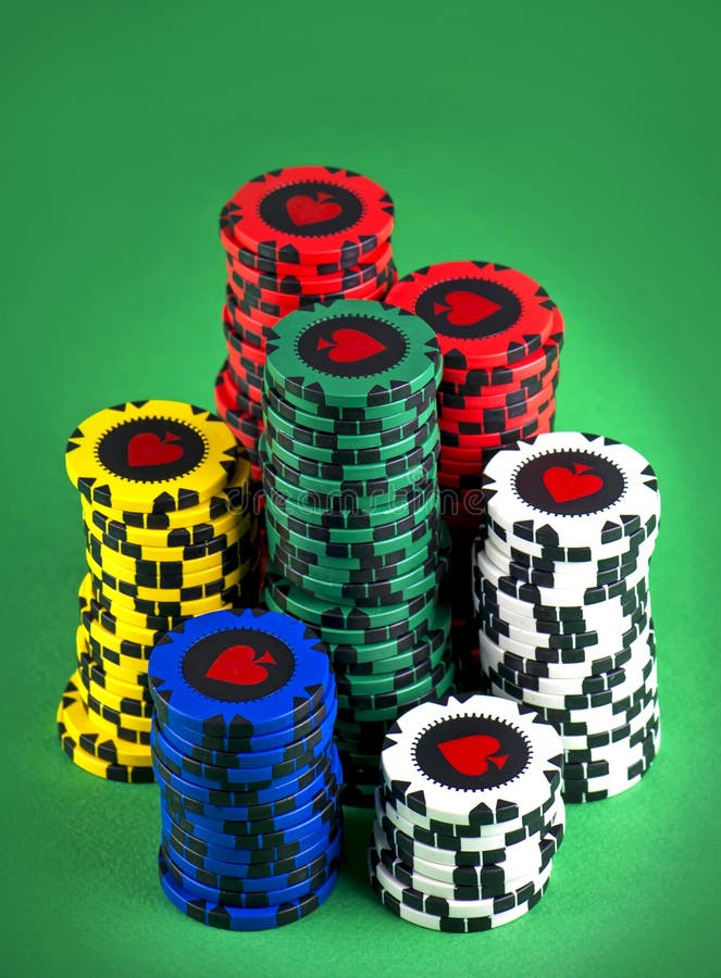 Poker Chips on a Green Gaming Table. Stock Photo Image of object