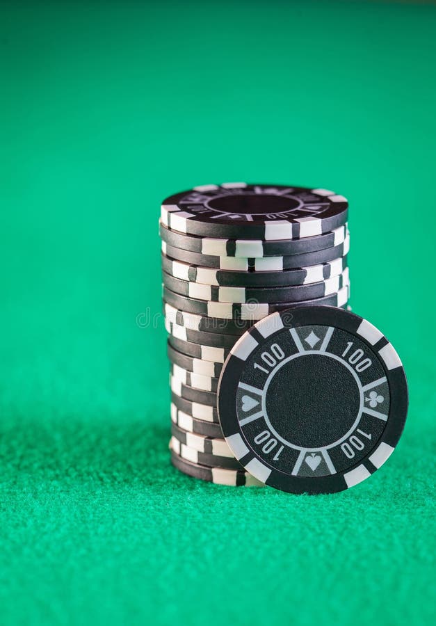 Poker Chips Stacked on Green Table Stock Image Image of gamble, black