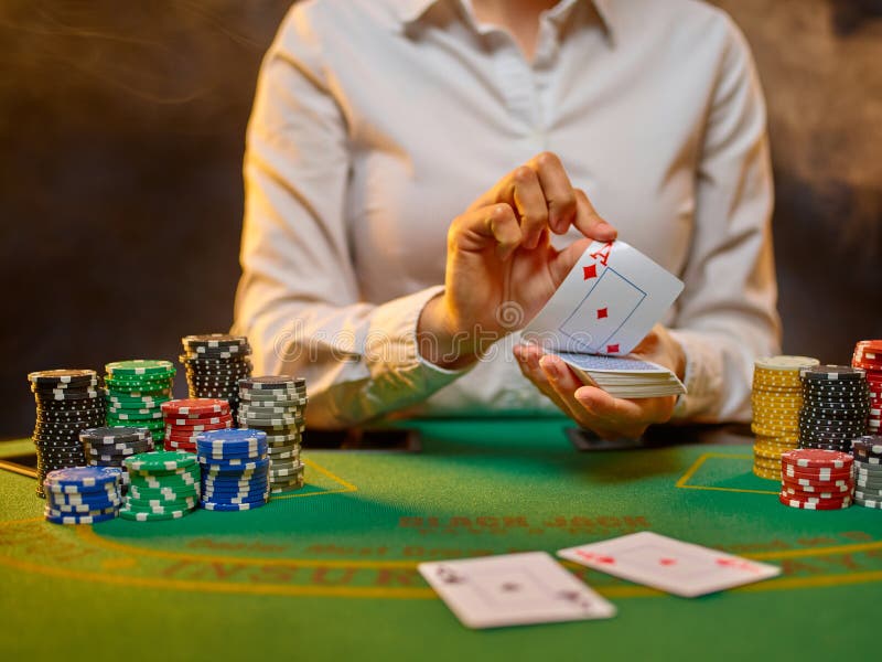 Poker Club. a Croupier Girl in a Uniform White Shirt Holds Cards in Her Hands. Lots of Colored Chips. Gambling, Casino, Night Club Stock Image - Image of green, jack: 228173851