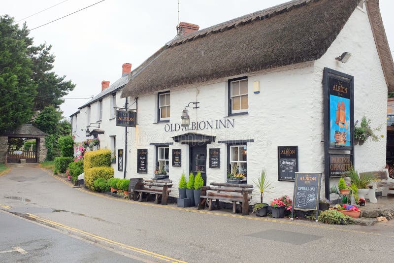 Crantock, Cornwall, UK. June 28, 2017. The thatched Old Albion Inn in the charming village of Crantock in Cornwall. Crantock, Cornwall, UK. June 28, 2017. The thatched Old Albion Inn in the charming village of Crantock in Cornwall.