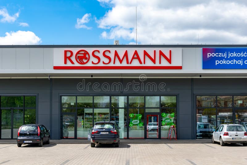 Entrance of a Rossmann Store. The Rossmann GmbH commonly known as Rossmann  Drogeria Parfumeria Cosmetic Shop is the second largest drugstore chain bas  Stock Photo - Alamy