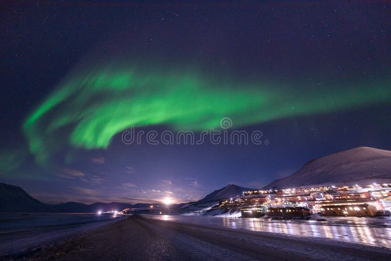Polar arctic Northern lights aurora borealis sky star in Norway Svalbard in Longyearbyen city travel mountains royalty free stock photography Polar arctic Northern lights aurora borealis sky star in Norway Svalbard in Longyearbyen city travel mountains royalty free stock photography