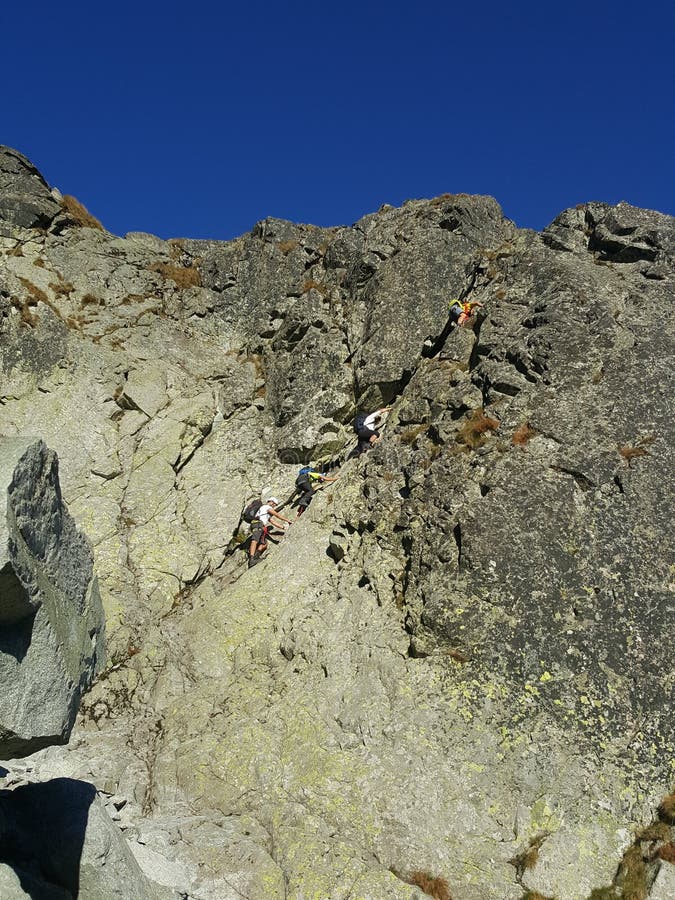 Polen Malopolska, Tatra berg - en klättring på det Gerlach berget arkivfoton Polen Malopolska, Tatra berg - en klättring på det Gerlach berget arkivfoton