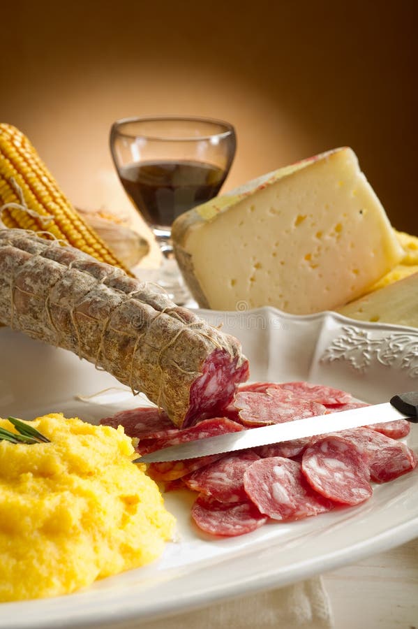 Polenta com salami foto de stock. Imagem de gourmet, coma 16028612