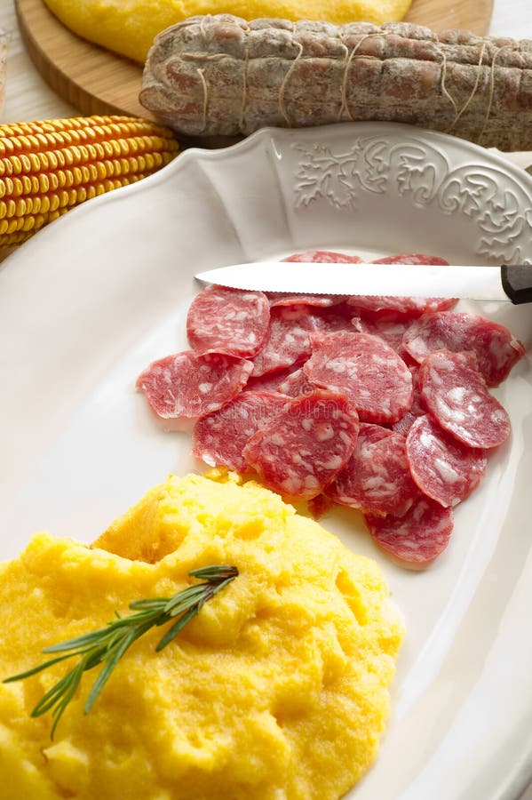 Polenta with salami stock image. Image of light, delicious 16028705