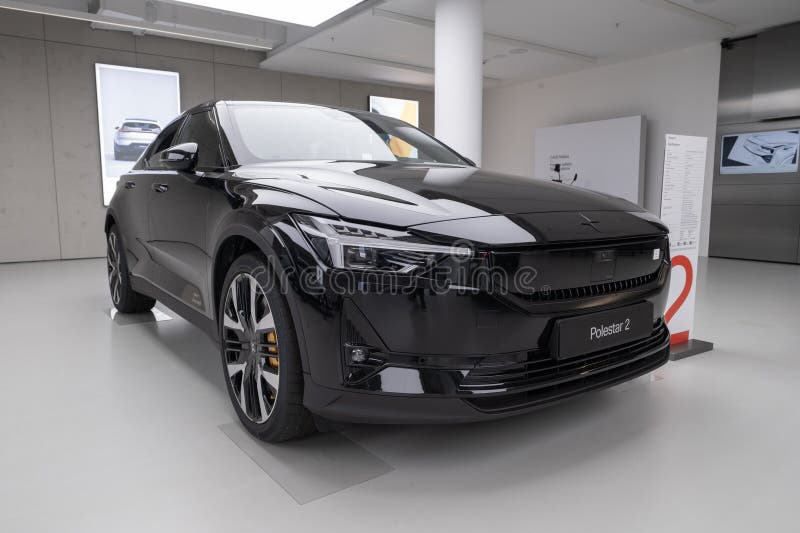 Polestar 2 car model in Studio, Volvo EV subsidiary, grey electric passenger vehicle in exhibition hall, alternative energy development, High Tech Technology, Stuttgart, Germany - December 16, 2024. Development ev stock images, royalty-free photos and pictures