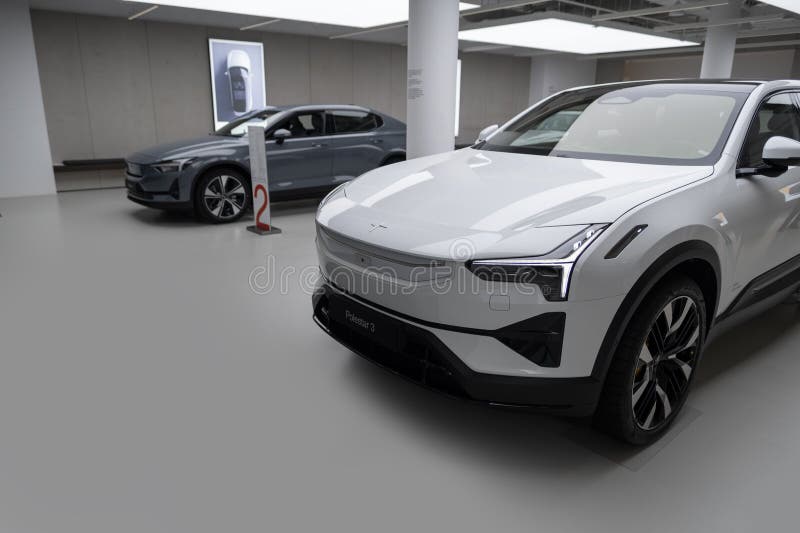 Polestar 2 car model in Studio, Volvo EV subsidiary, grey electric passenger vehicle in exhibition hall, alternative energy development, High Tech Technology, Stuttgart, Germany - December 16, 2024. Development ev stock images, royalty-free photos and pictures
