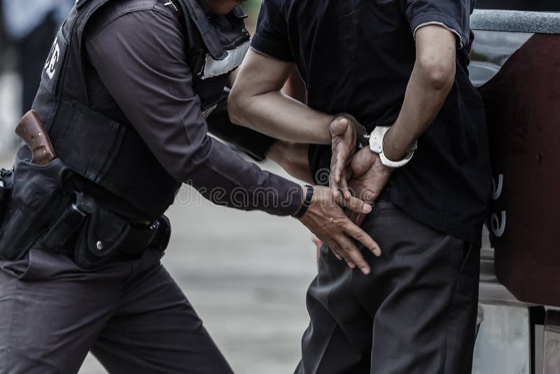 Police arrêtée, police, arme à feu image libre de droits Police arrêtée, police, arme à feu image libre de droits