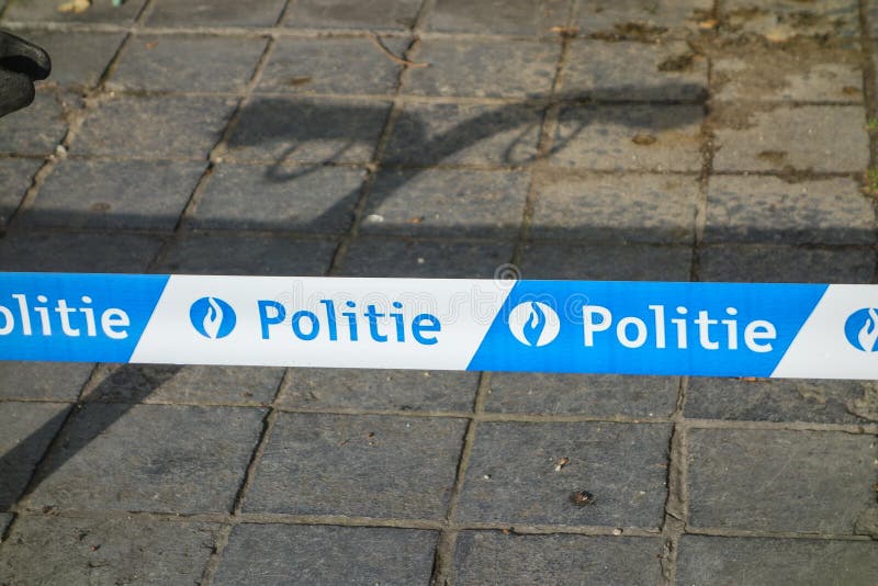 Police line sign in Brugge editorial photography. Image of line - 75814152