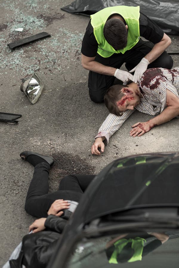 Policeman helping victims royalty free stock photos Policeman helping victims royalty free stock photos