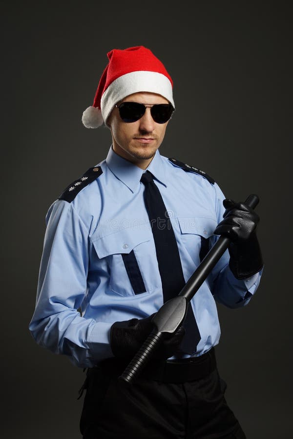 Policier comme Santa photographie stock libre de droits