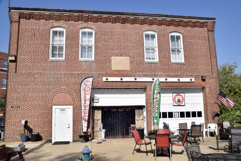 Hampton VA,USA. October 4,2019. US Army's oldest firehouse at Fort Monroe. Now Firehouse Coffee. Tables and chairs outside. Hampton VA,USA. October 4,2019. US Army's oldest firehouse at Fort Monroe. Now Firehouse Coffee. Tables and chairs outside.